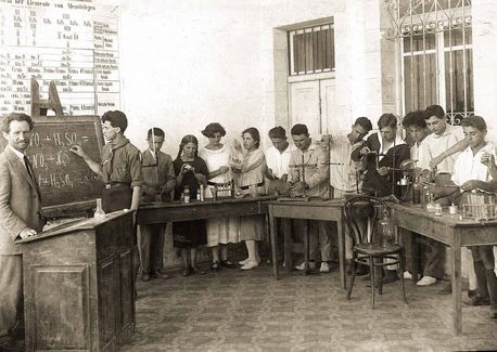 Chemistry lesson in HaGymnasia HaIvrit in Jerusalem, 1923. The school was on KKL-JNF purchased land in Bukhara Quarter and later in Rehavia. KKL-JNF Photo Archive Chemistry lesson in HaGymnasia HaIvrit in Jerusalem, 1923. The school was on KKL-JNF purchased land in Bukhara Quarter and later in Rehavia. KKL-JNF Photo Archive