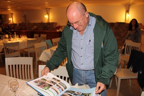 Resources Development and PR Division presents Avi with a special album, November 2016. Photo: Yoav Devir