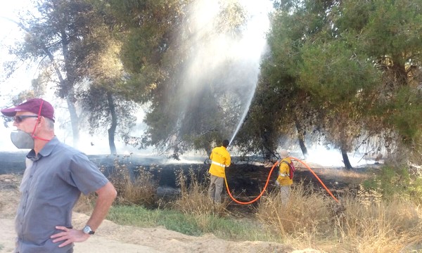 KKL-JNF firefighters douse flames in Beeri Forest. Photo: Danny Ben-David, KKL-JNF