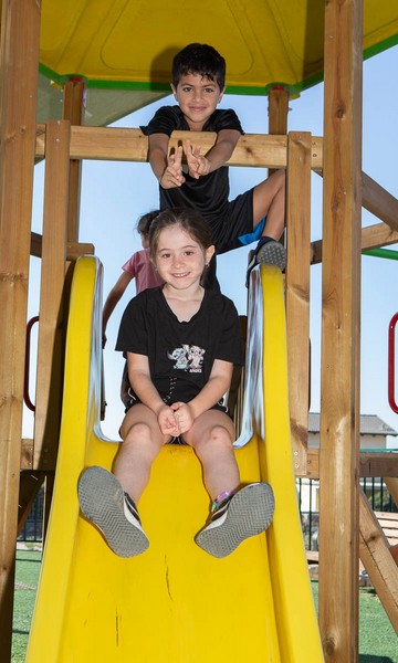 Neighborhood children enjoy the Kibbutz Yifat playground. Photo: Yoni Sheffer