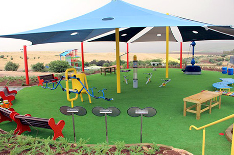 Accessible playground equipment in the Jordan River Village. (Photo: Yoav Dvir, KKL-JNF Photo Archive)